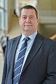 Porträtfoto des Kanzlers Markus Leber